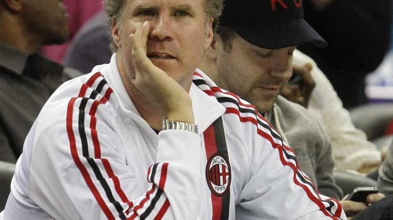 Actor Will Ferrell looks on during the first half of...