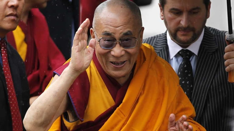 The Dalai Lama, the Tibetan Buddhist spiritual leader, arrives at...