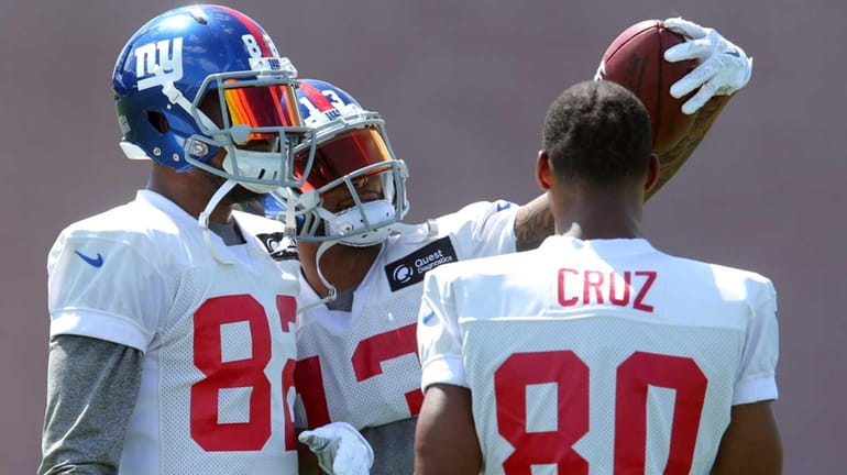 Giants wide receivers Rueben Randle and Odell Beckham Jr. take...