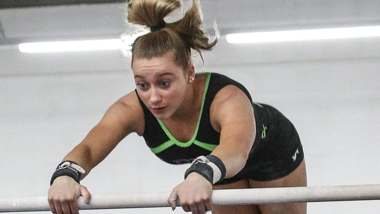 Katie Finnegan, Kings Park, works out in her gymnasticÕs gym...
