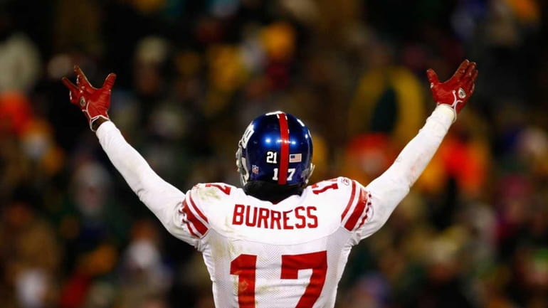 Plaxico Burress reacts to the crowd during the NFC championship...