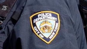 Two NYPD officers were shot and wounded Wednesday night in...