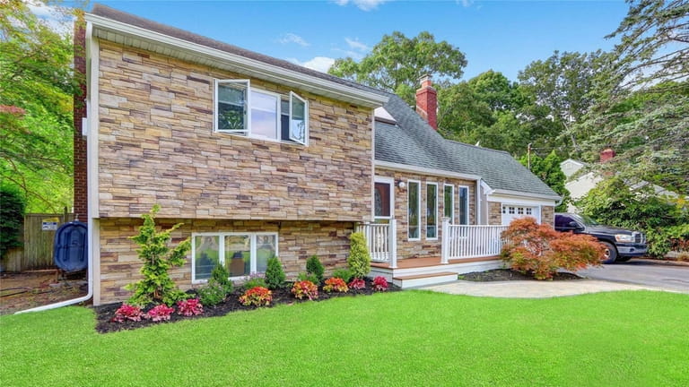 This three-bedroom house in Bellport, where the median home price...