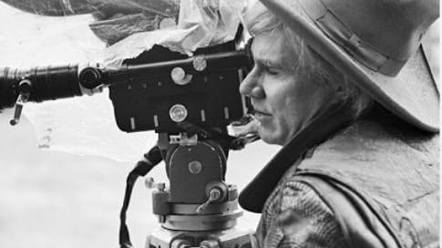 Andy Warhol works behind the camera on the Arizona set...