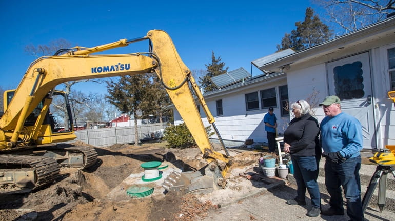 A septic system is installed at the home of Dorothy...