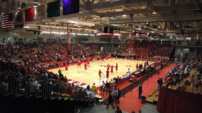 A sellout crowd of 4,423 at Stony Brook Arena watched...
