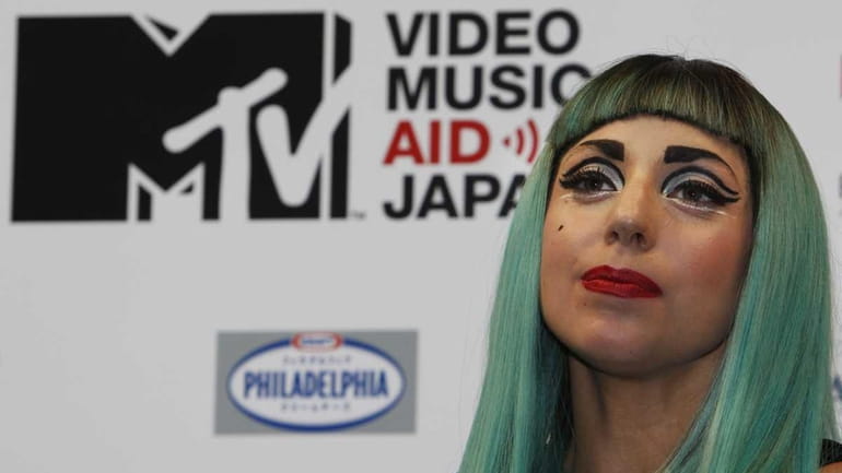 Lady Gaga attends a press conference to promote MTV Video...