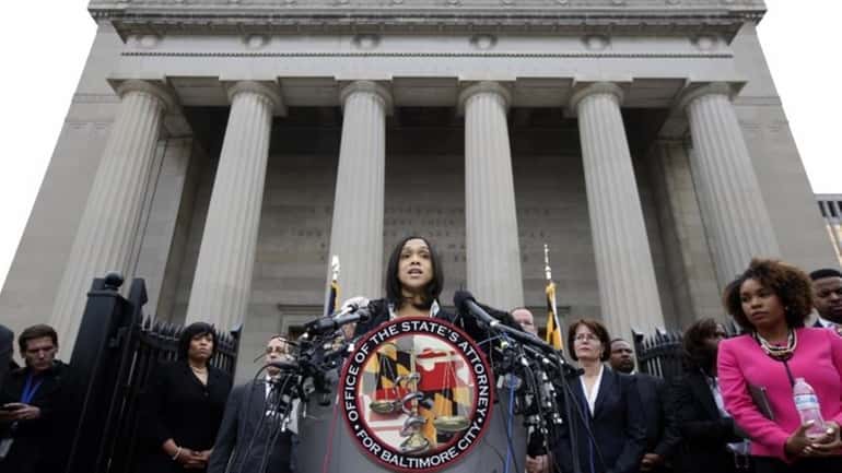 Marilyn Mosby, Baltimore's top prosecutor, speaks during a news conference...
