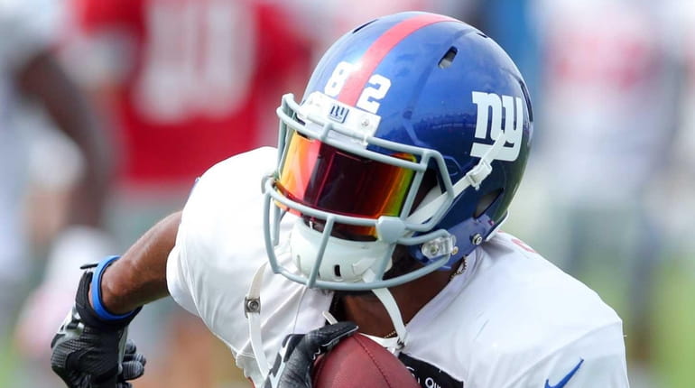 New York Giants wide receiver Rueben Randle runs with the...