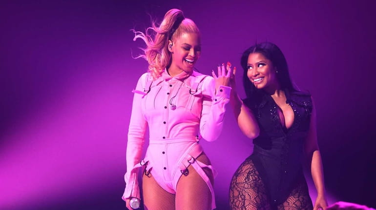 Beyonce, left, and Nicki Minaj perform during the TIDAL X:...