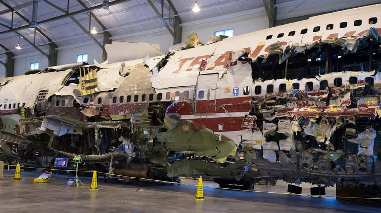 The reconstructed TWA Flight 800 747 has spent two decades in...
