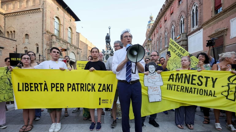 Protesters demonstrate in support of Patrick Zaki by the Piazza...