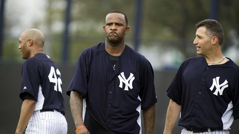 From left, Yankees pitchers Mariano Rivera, CC Sabathia and Andy...