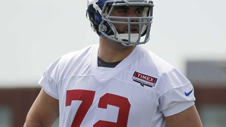 Tackle Justin Pugh looks on during Giants mini camp at...