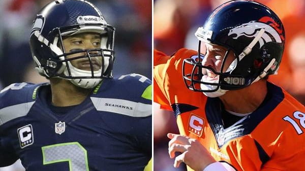 Seahawks quarterback Russell Wilson and Broncos quarterback Peyton Manning are...