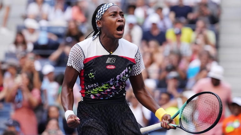 Coco Gauff celebrates after defeating Madison Keys in straight sets...