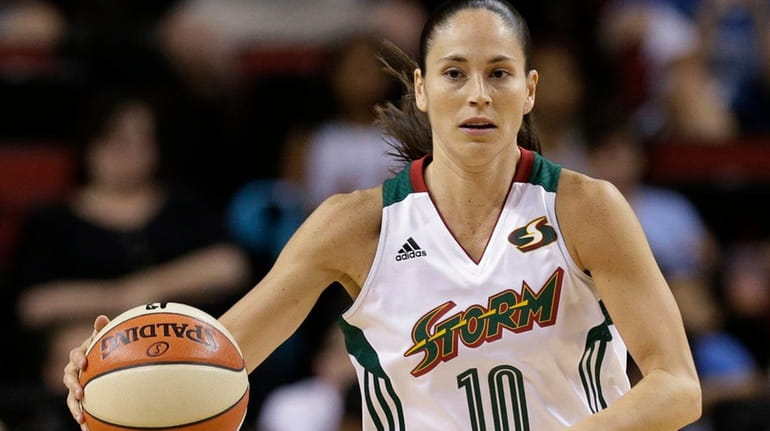 The Seattle Storm's Sue Bird brings the ball upcourt against...