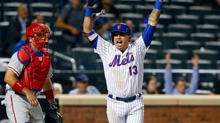 Asdrubal Cabrera of the New York Mets celebrates his 11th-inning...