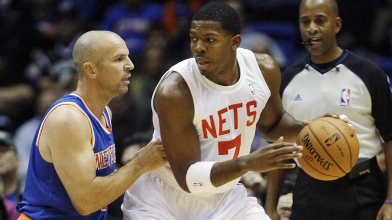 Jason Kidd of the Knicks, left, defends against Brooklyn Nets...