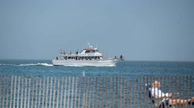 A fishing boat sails out of Captree in Babylon on...