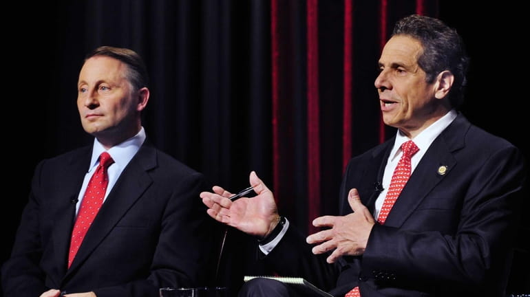 New York State Republican gubernatorial candidate Rob Astorino, left, listens...