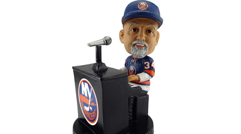 The Billy Joel bobblehead that will be given to the...