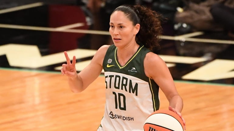 Seattle Storm guard Sue Bird calls a play against the...