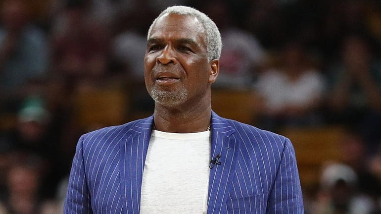 Head coach Charles Oakley of Killer 3s reacts against Tri...