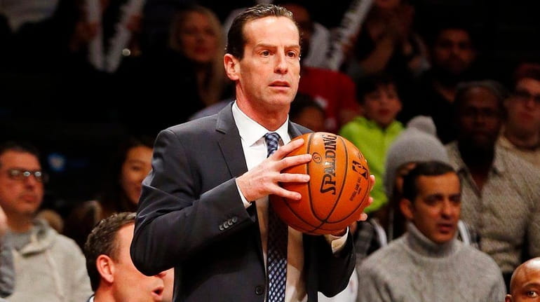 Head coach Kenny Atkinson of the Brooklyn Nets looks on...