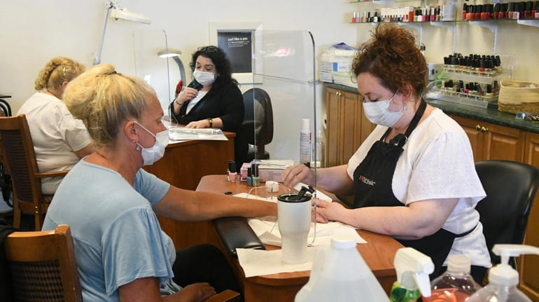 Customers and employees at LI nail salons will be required...