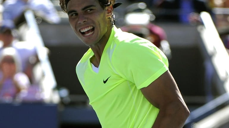 Rafael Nadal from Spain celebrates after his win against Mikhail...