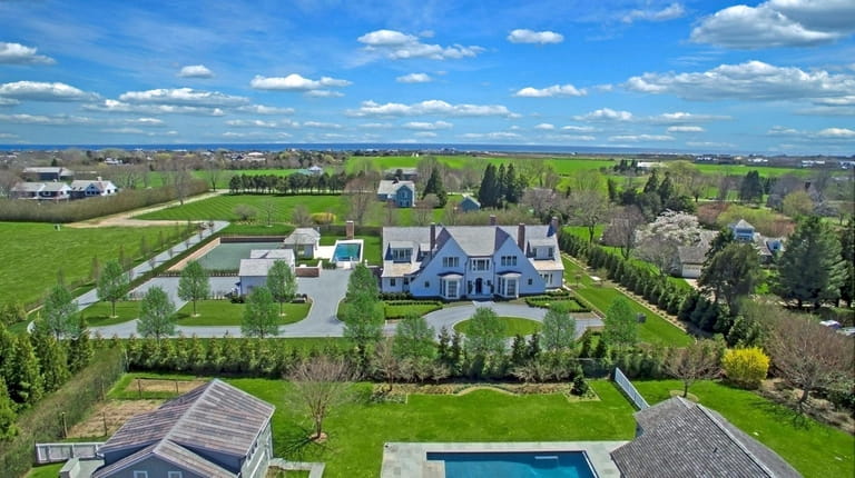 This 11,000-square-foot home for rent in Sagaponack has seven bedrooms,...