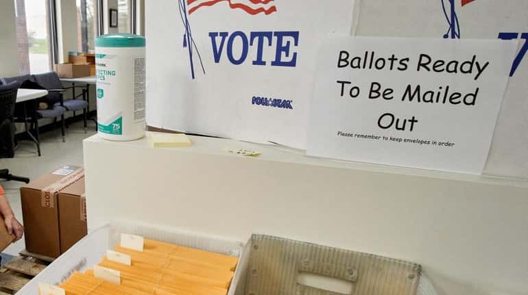 Mail-in ballots are prepared in April in Nebraska for the...