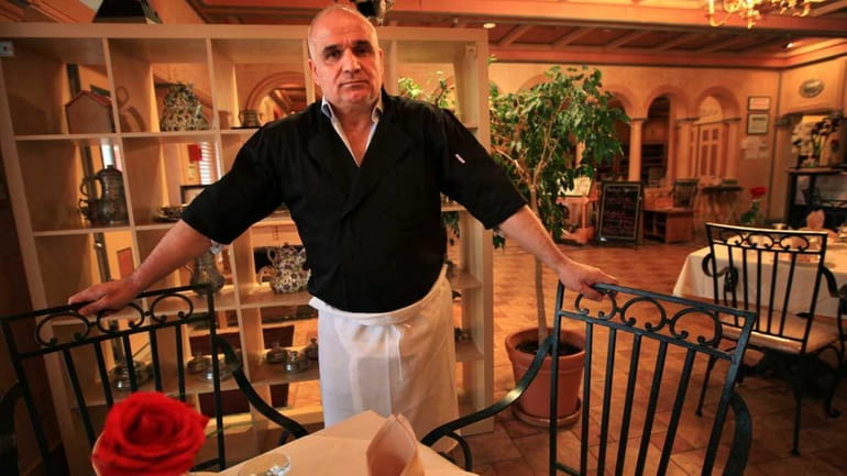 Joff Cafer Sahin, owner of Pita House restaurants in Setauket...