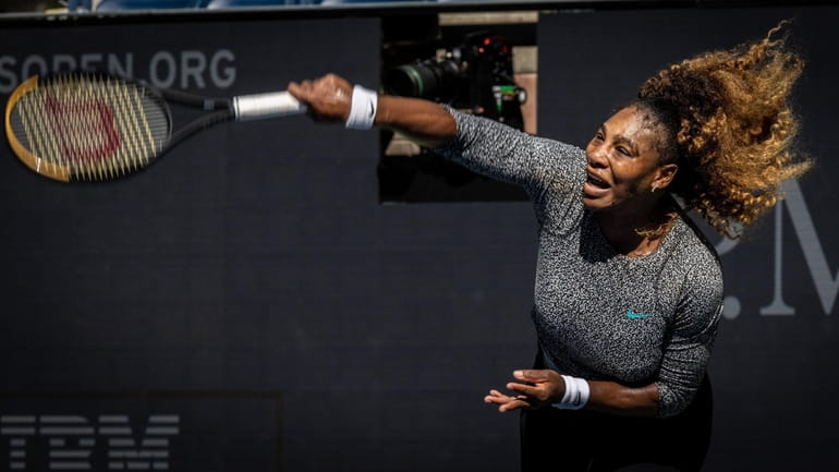 Serena Williams training with Ons Jabeur of Tunisia for the...
