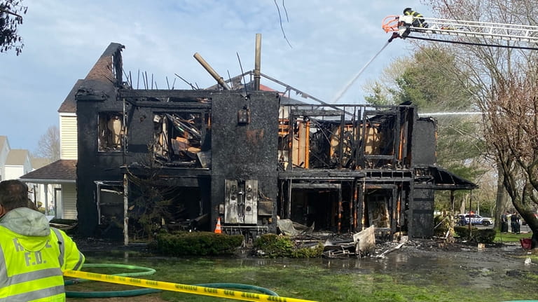 The Middle Island condo suffered severe damage in an April fire.