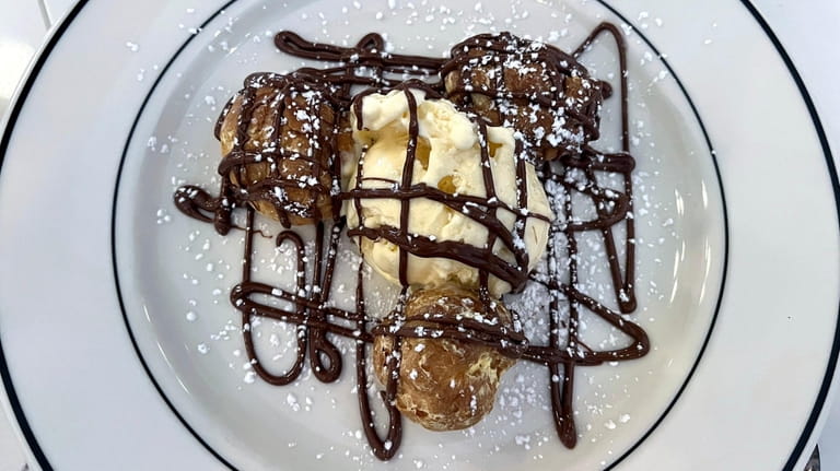 Classic profiteroles at the new Brasserie by Chef Aless in...