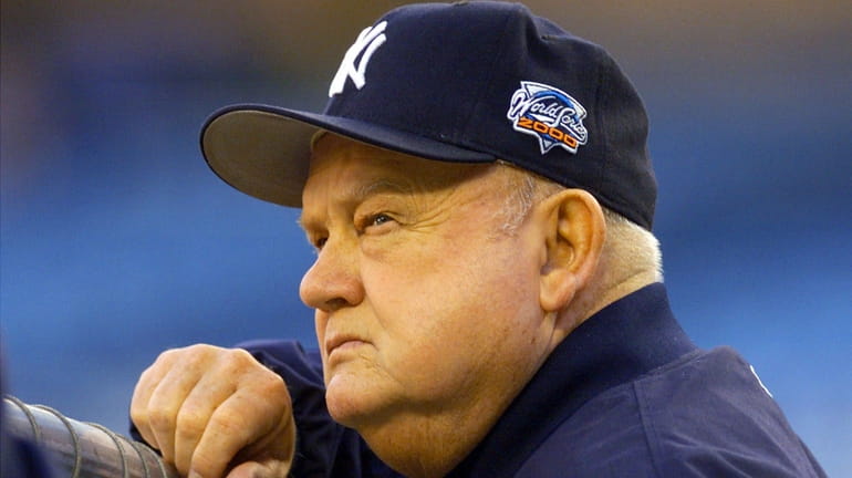 Yankees bench coach Don Zimmer watches his team warm up...