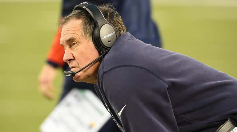 New England Patriots head coach Bill Belichick on the sidelines...