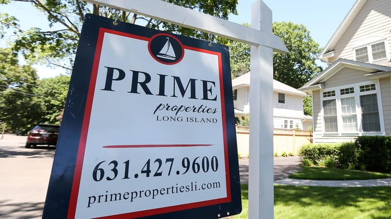 A Prime Properties Long Island sign during an open house...