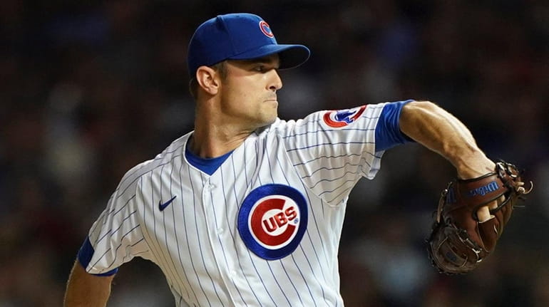 David Robertson of the Cubs throws a pitch during the...