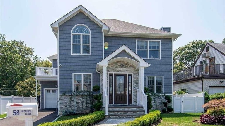 Priced at $1,447,000, this five-bedroom, five-bathroom Colonial on Primrose Drive...