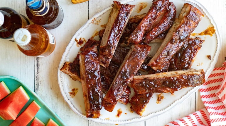 Spice-rubbed ribs are brushed with a sweet and spicy glaze...