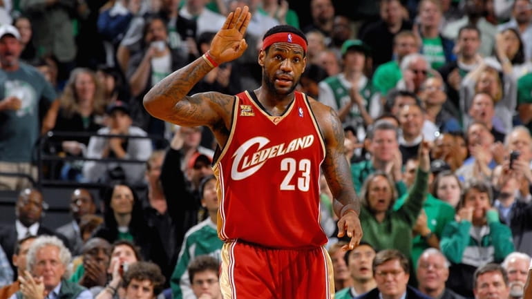 LeBron James #23 of the Cleveland Cavaliers reacts in Game...