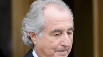 Disgraced financier Bernard Madoff leaves federal court in Manhattan in...