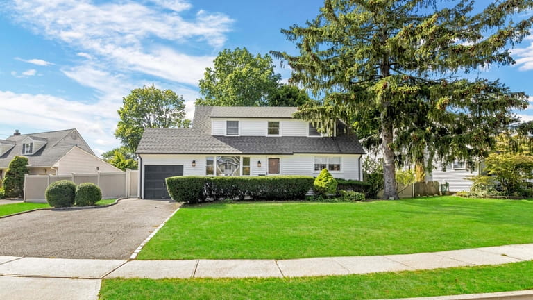 Priced at $639,000, this expanded Cape on Yorkshire Drive is...