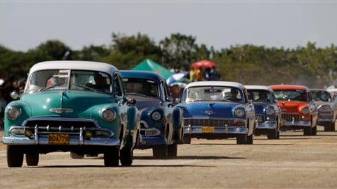 Drivers bring their classic cars to compete in a quarter...