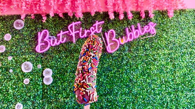 A chocolate covered banana with sprinkles at Tandy’s Bubbles in...
