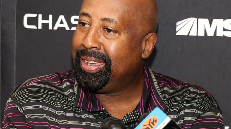 Mike Woodson talks to media at the Knicks' training facility...