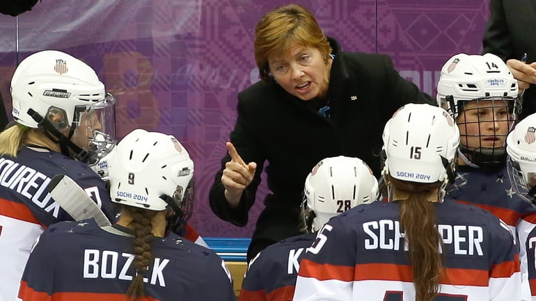 USA head coach Katey Stone talks to the team during...